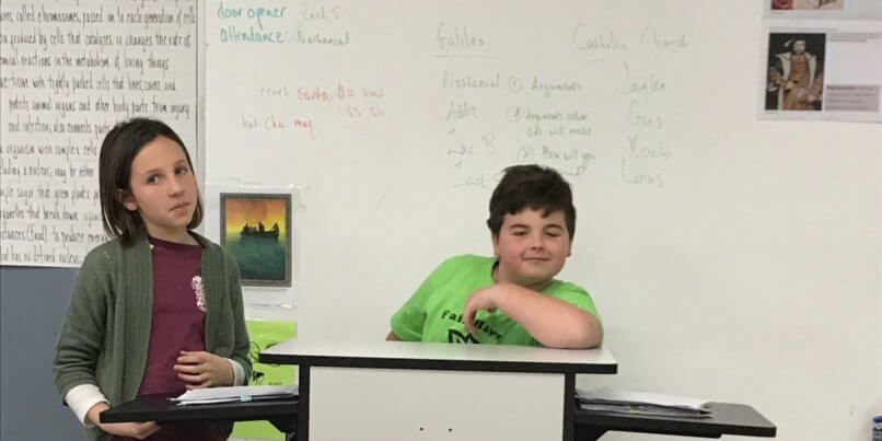 Two students reenacting Galileo's trial