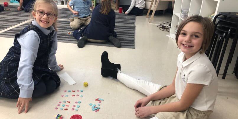 3rd Graders playing division game