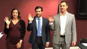 Myranda Fabian, Tyler Horning and Troy Morris being sworn in as official board members
