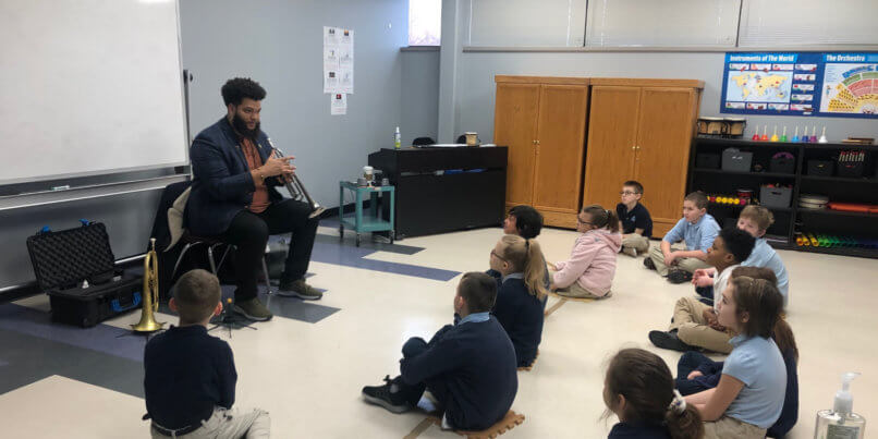 Mr. Johnson teaching music class