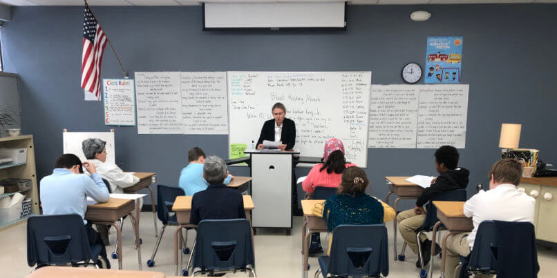 5th grade classroom listening to teacher