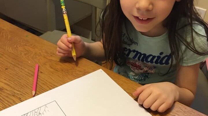 Ivywood student working on a project at home