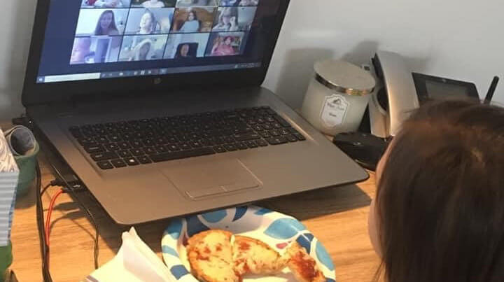 Student meeting with class over Zoom