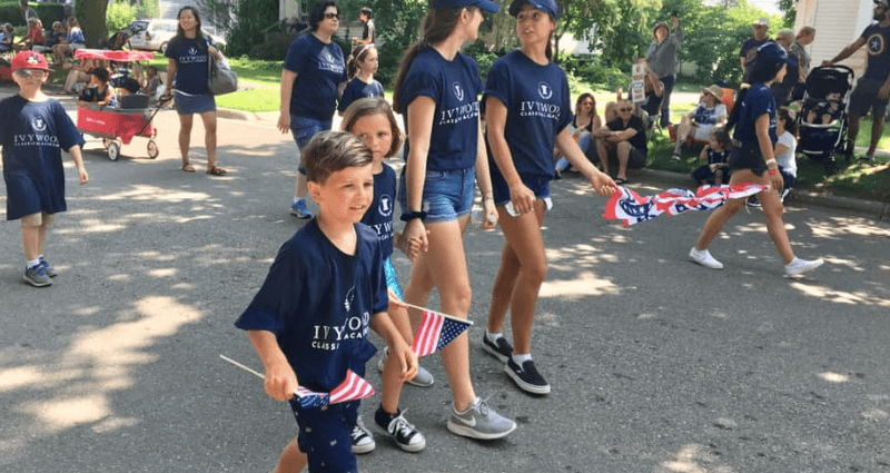 Ivywood community members walking in the Novi parade
