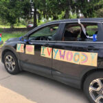 Vehicle with "We love Ivywood" written on the side.